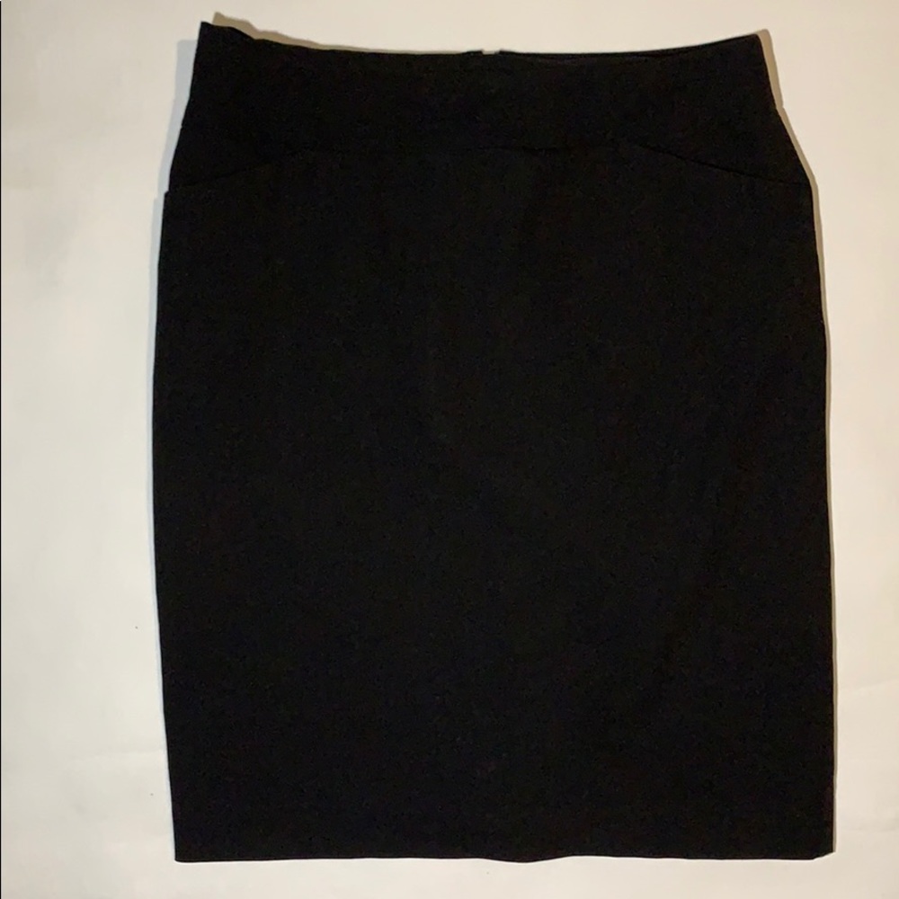 Black knee length Nicole Miller skirt.